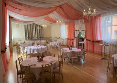 The Main Hall at Dumbleton Village Hall decorated for a wedding reception