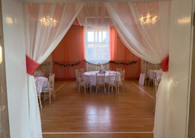 The Main Hall at Dumbleton Village Hall decorated for a wedding reception